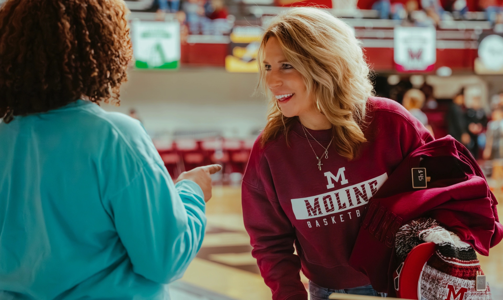 Stitch Please spirit wear at a Moline basketball game